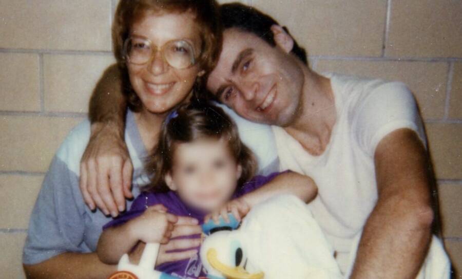 Carol Ann Boone, Rose Bundy, and Ted Bundy posing for a photo in a prison